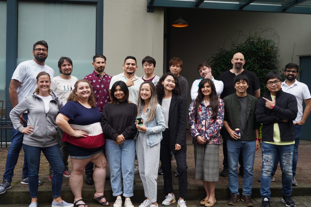 A group of diverse individuals, Pace Creative's team in 2021
